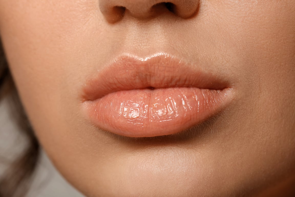 Young Woman with Nude Lipstick, Closeup